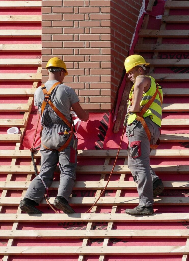 construction site workers for Roofing contractor in Homestead, FL