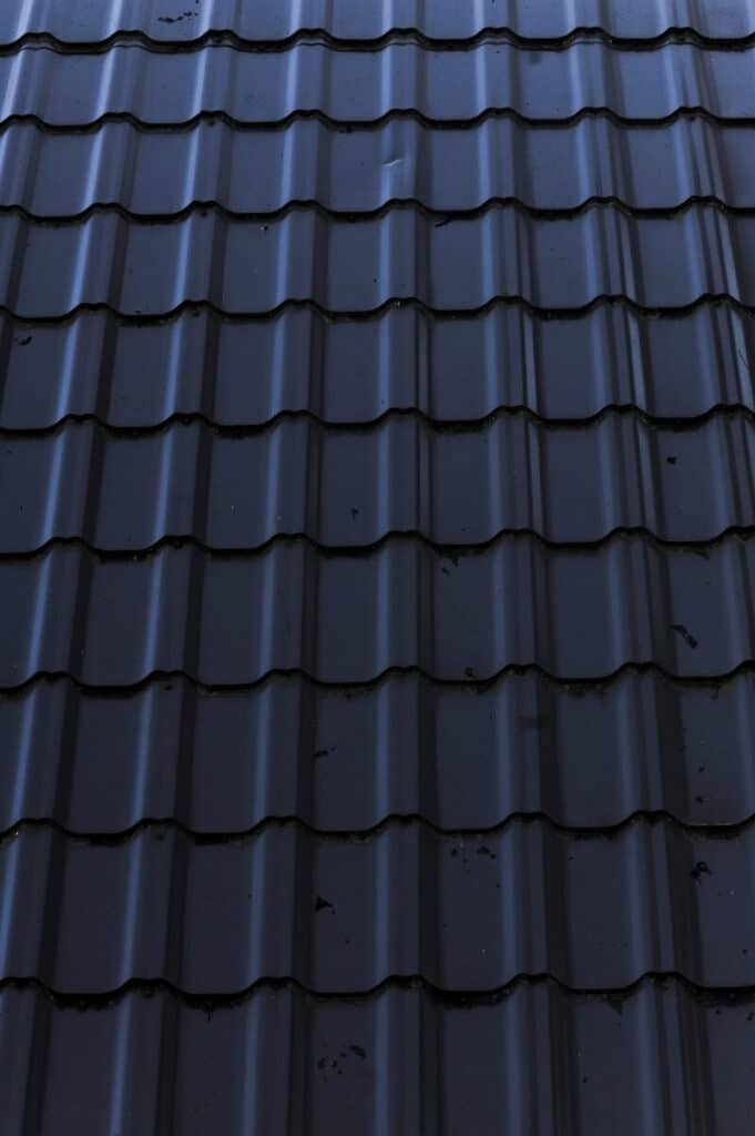 a close up of a metal roof with a sky background For Roofing Contractor in Boynton, FL
