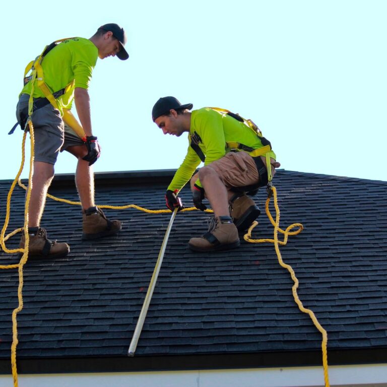 Roofing contractor near me completing a residential roof project in Palm City, FL