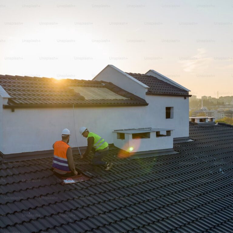Roofing contractor near me completing a residential roof project in Jensen Beach, FL
