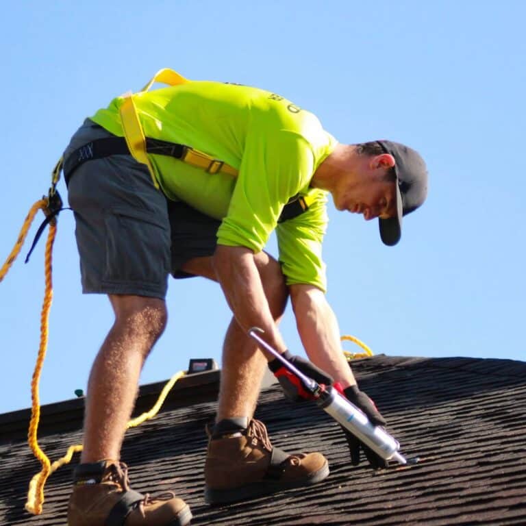 Roofing contractor near me completing a residential roof project in Hobe Sound, FL