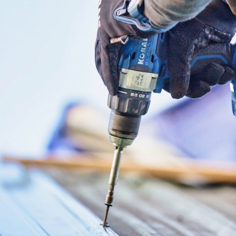 Roofing crew completing roofing work for a roofing contractor in Indiantown, FL