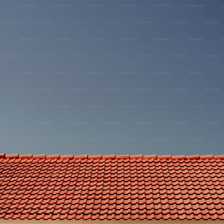 Roofing contractor near me completing a residential roof project in Indiantown, FL