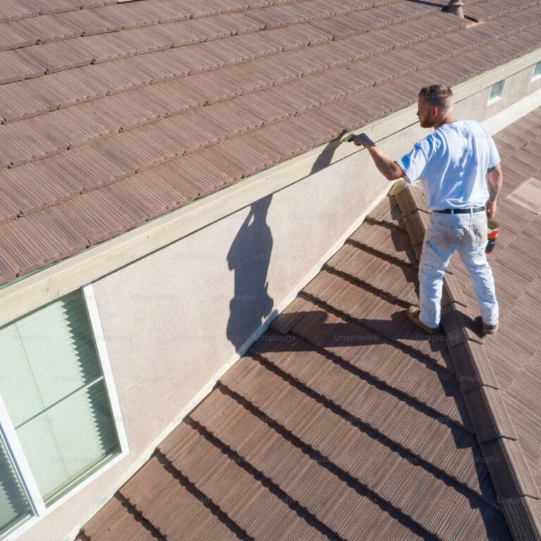 Roofing contractor near me completing a residential roof project in Port St. Lucie, FL