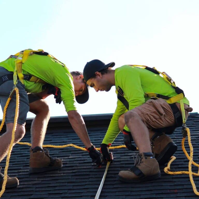 Roofing contractor near me completing a residential roof project in River Park, FL